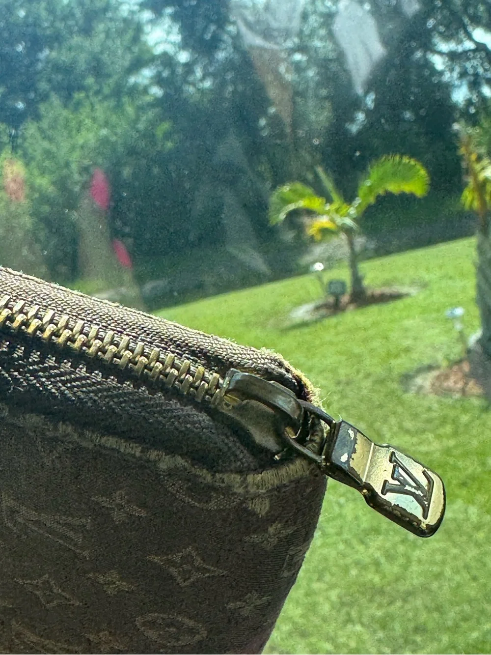 Louis Vuitton MiniLin Canvas Zip Wallet in Brown